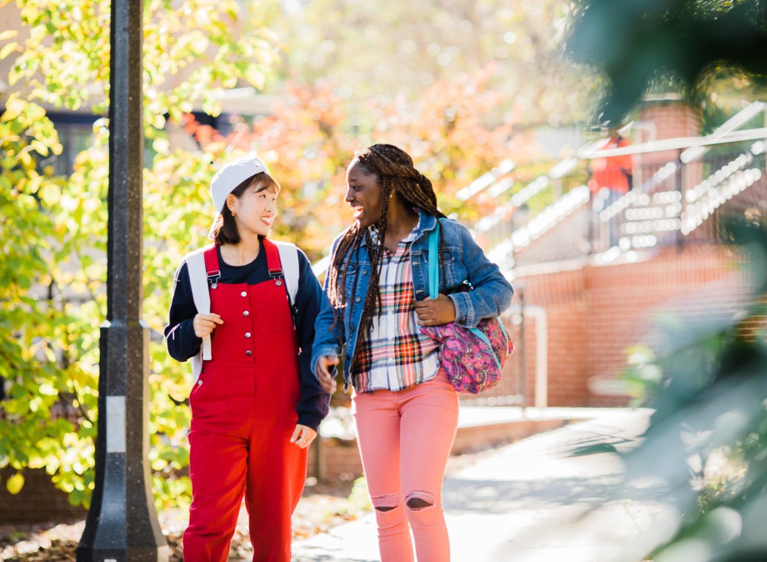 students walking outside Melson Hall